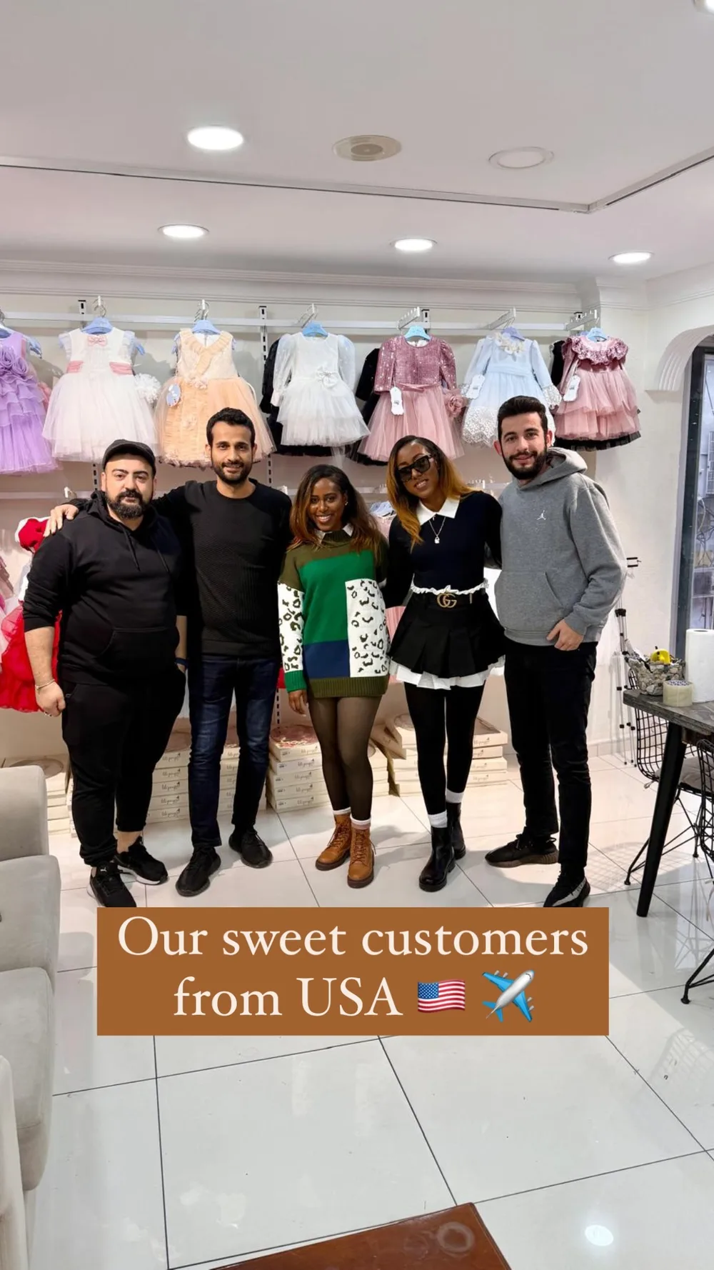 Wholesale visitors at a children's clothing showroom in Laleli